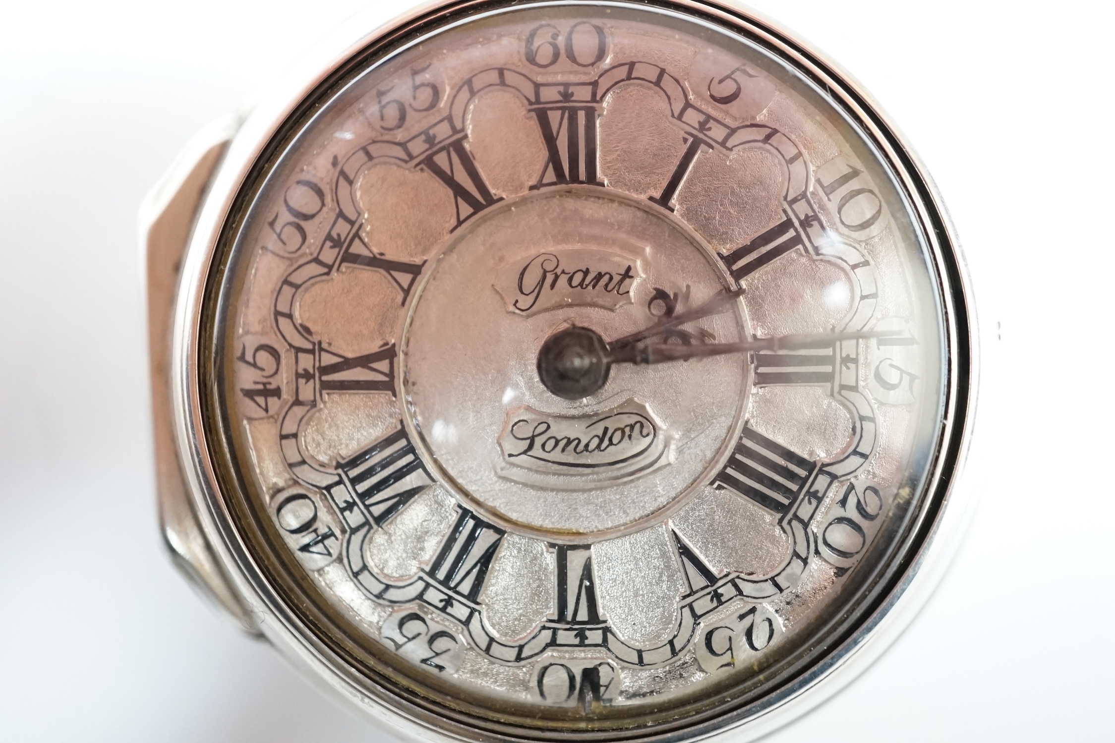 A late George II silver pair cased keywind verge pocket watch by William Grant of London, with Roman dial, the signed movement numbered 6984, outer case diameter 48mm.